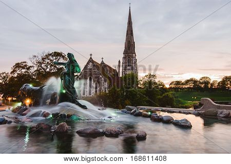 Gefion Fountain and St. Alban's Church in Copenhagen, Denmark. Anglican church of Saint Alban and Gefion fountain in Danish capital.