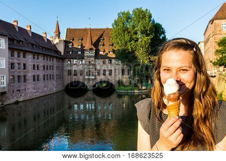 Girl Is Holding A Big Ice Cream In Front Her Face