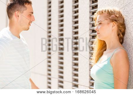 Man Flirting With Girl On City Street