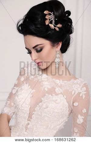 Gorgeous Bride With Dark Hair In Luxuious Wedding Dress