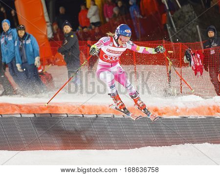 STOCKHOLM SWEDEN - JAN 31 2017: Mikaela Shiffrin (USA) makes a spectaculare jump in the downhill skiing parallel slalom event at the Alpine Audi FIS Ski World Cup. January 31 2017 Stockholm Sweden