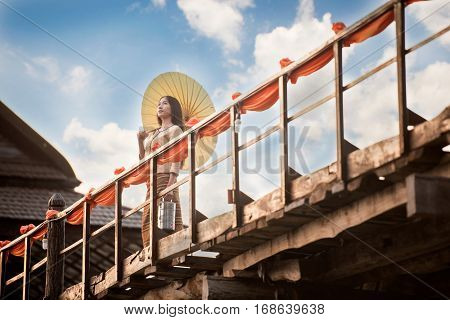 Portrait of Beautiful rural thai woman wear thai dress
