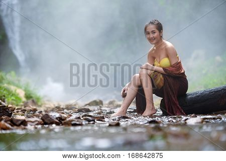Portrait of Beautiful rural thai woman wear thai dress
