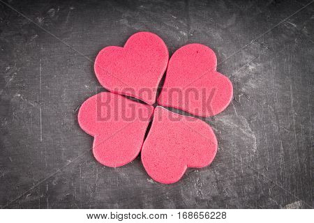 red and pink hearts on grey background