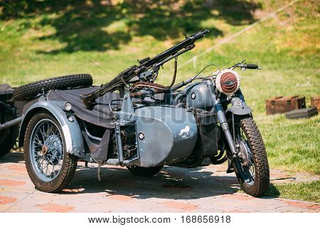 Gomel, Belarus - May, 09, 2016: The Old Rarity Blue Tricar Three-Wheeled Motorbike With The Machine Gun On Sidecar Of Wehrmacht Armed Forces Of Nazi Germany Of World War 2 Time In Summer Sunny Park.