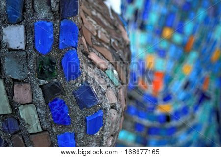 Colorful pattern of geometric mosaic old wall from smalt.