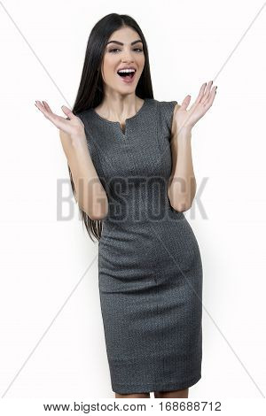 Young business woman laughing with open hands.