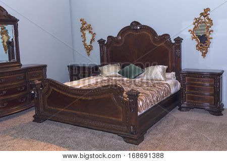 Luxurious bedroom furniture in a classic style. Interior