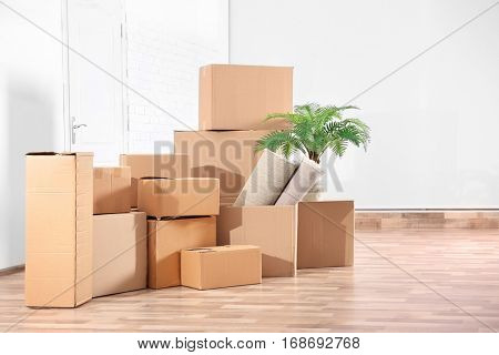 Pile of boxes for moving in office