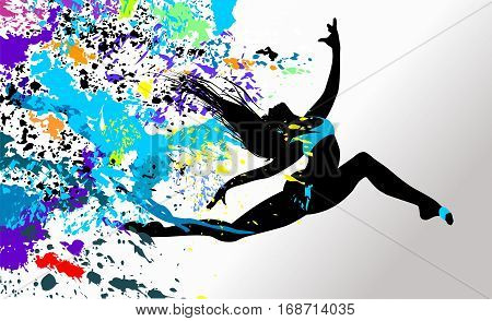 Beautiful dancing girl in bright multicolored splatters.