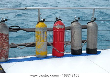 Diving air tanks air-tanks on a boat at sea catamaran