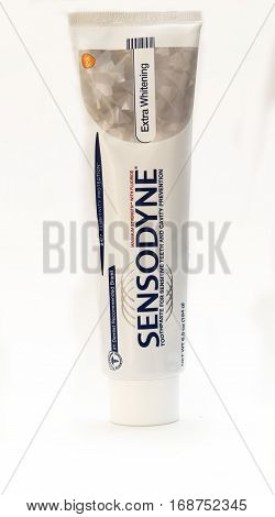New York January 25 2017: A tube of Sensodyne toothpaste isolated on white background.