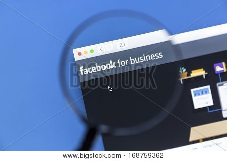 Ostersund, Sweden - January 14, 2017 Closeup of Facebook Business website under a magnifying glass. Facebook is the most visited social network in the world