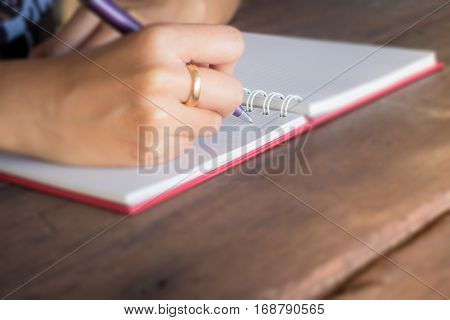 Noteboook paper on wood background stock photo