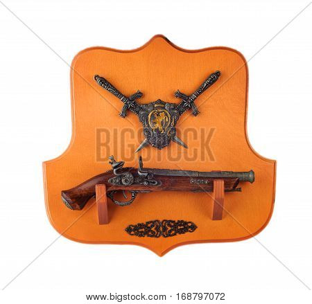 miniature pistol daggers and coat of arms on a wooden stand
