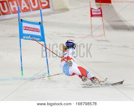 STOCKHOLM SWEDEN - JAN 31 2017: Rear view of Melanie Meillard (SUI) in the downhill skiing in the parallel slalom alpine event Audi FIS Ski World Cup. January 31 2017 Stockholm Sweden