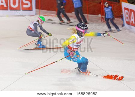 STOCKHOLM SWEDEN - JAN 31 2017: Side view of Frida Hansdotter (SWE) and competitor in the parallel slalom downhill skiing at the Alpine Audi FIS Ski World Cup - city event January 31 2017 Stockholm Sweden