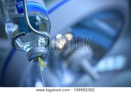 Infusion drip in hospital on blurred background
