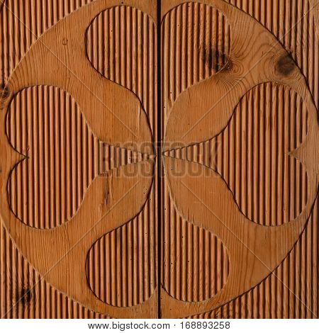 Textures patterns and backgrounds concept. Light old wooden wall detail board with decoration closeup