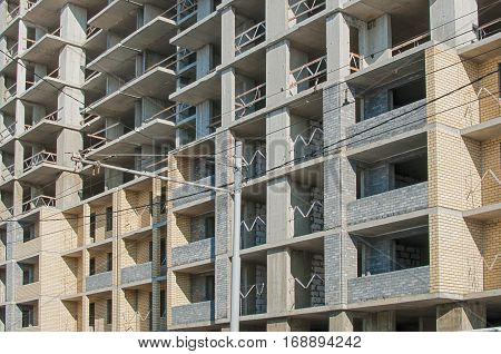 Monolithic concrete frame of new building close-up