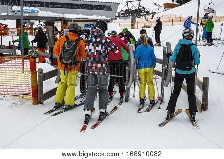 HINTERTUX, AUSTRIA - MARCH 29, 2015: The ski lift Sun Jet at the Horberg mountain in Tyrol Austria with people in the queue for a lift to the mountaintop