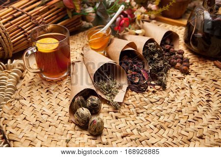 Variations of seasoning for tea healthy additions for nutrition beverage. Dry herb as aromat condiment.