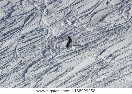 Snowboarder having fun skiing offside on the snowy mountain of the Hintertuxer Glacier (Tuxer Ferner) in Tyol Austria