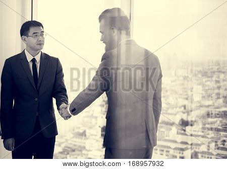 Business Partners Introductionary Handshake Bow