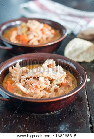 typical Italian dish tripe with beans potatoes and veal
