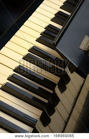 Keys of old piano, cozy place, top view