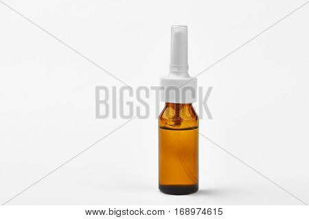 Nasal spray vial. Bottle with medicine liquid. Health as a priority.