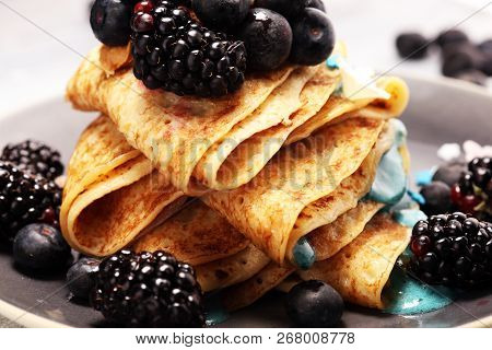 Delicious Tasty Homemade Crepes Or Pancakes With Blackberries,blueberries And Blue Spirulina Nicecre