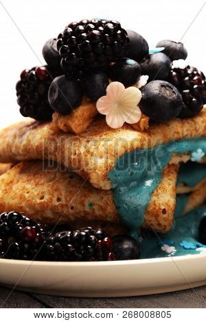 Delicious Tasty Homemade Crepes Or Pancakes With Blackberries,blueberries And Blue Spirulina Nicecre