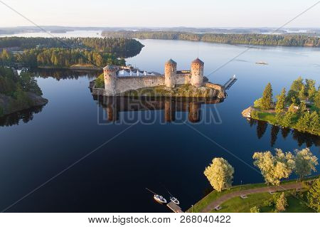 View Of The Olavinlinna Fortress In The Kuusalmi Strait On A July Morning (shooting From A Quadcopte