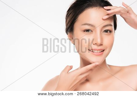 Beautiful Young Asian Woman With Clean Fresh Skin Look. Girl Beauty Face Care. Facial Treatment. Cos