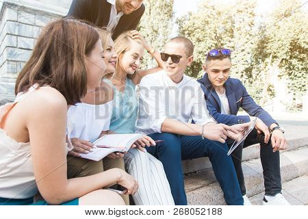 Meeting Of Young People, Team Of Businessmen In Nature. Lifestyle, Young Entrepreneurs