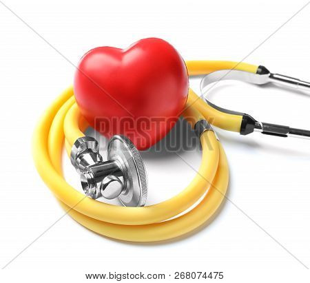 Stethoscope For Checking Pulse And Red Heart On White Background