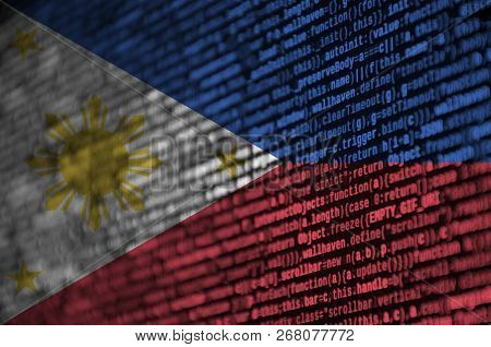 Philippines Flag  Is Depicted On The Screen With The Program Code. The Concept Of Modern Technology 