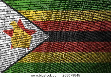 Zimbabwe Flag  Is Depicted On The Screen With The Program Code. The Concept Of Modern Technology And