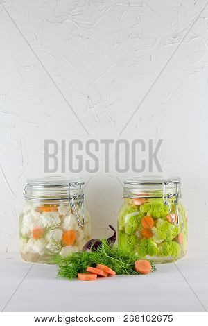 Home Made Cultured Vegetables In Jars Fermenting To Be Used As A Probiotic Food. Canned Food Concept