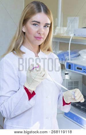 Young Scientist Works In Modern Biological Lab