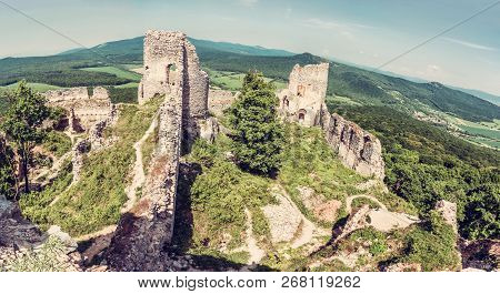 Ruins Of The Castle Gymes In Slovak Republic. Travel Destination. Panoramic Photo. Old Photo Filter.