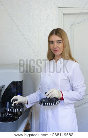 Young Scientist Works In Modern Biological Lab