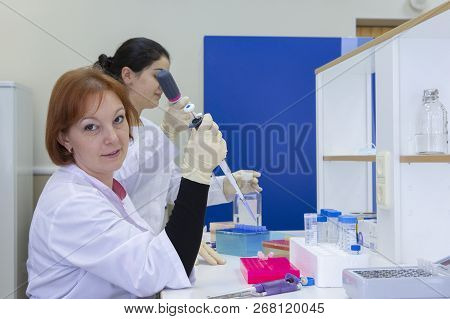 Portrait Of A Female Researcher Doing Research In A Lab