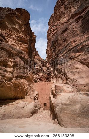 Water Containers In Al-siq Main Entrance Canyon To Petra, Jordan
