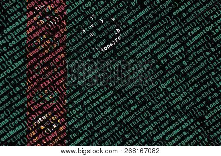 Turkmenistan Flag  Is Depicted On The Screen With The Program Code. The Concept Of Modern Technology