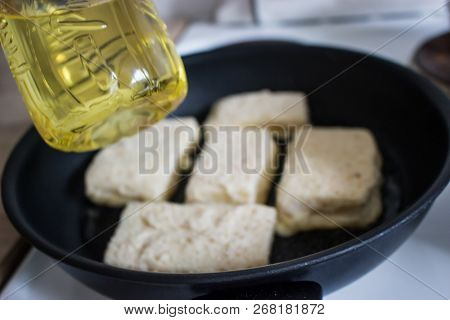 Frying Coated Cheese Eidam Slices In Breadcrumbs