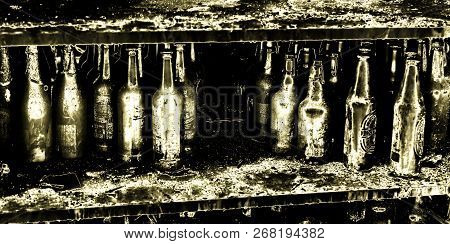 Close Up Damaged Supermarket Glass Plastic Bottles After Arson Fire With Burn Black Dark Debris Afte