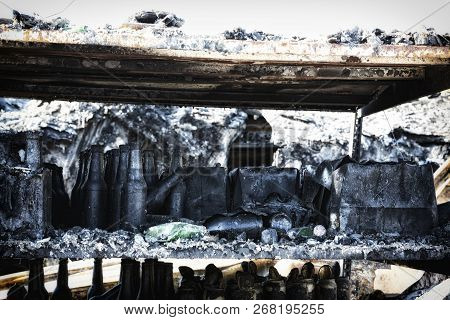 Close Up Damaged Supermarket Glass Plastic Bottles After Arson Fire With Burn Black Dark Debris Afte