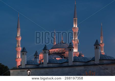 Blue Mosque At Night With Golden Illumination, Wide View Of Istanbul In Dusk. Sultanahmet Camii Mosq